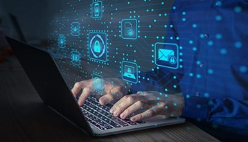 Person accessing secure cloud services with laptop showing security notifications