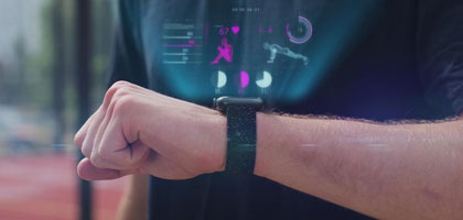 A person wearing a smartwatch with a heart rate monitor